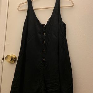 Black romper with cute brown buttons